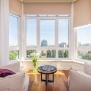 A nice living room in a cool home during the summer overlooking a urban part of Northern Virginia.